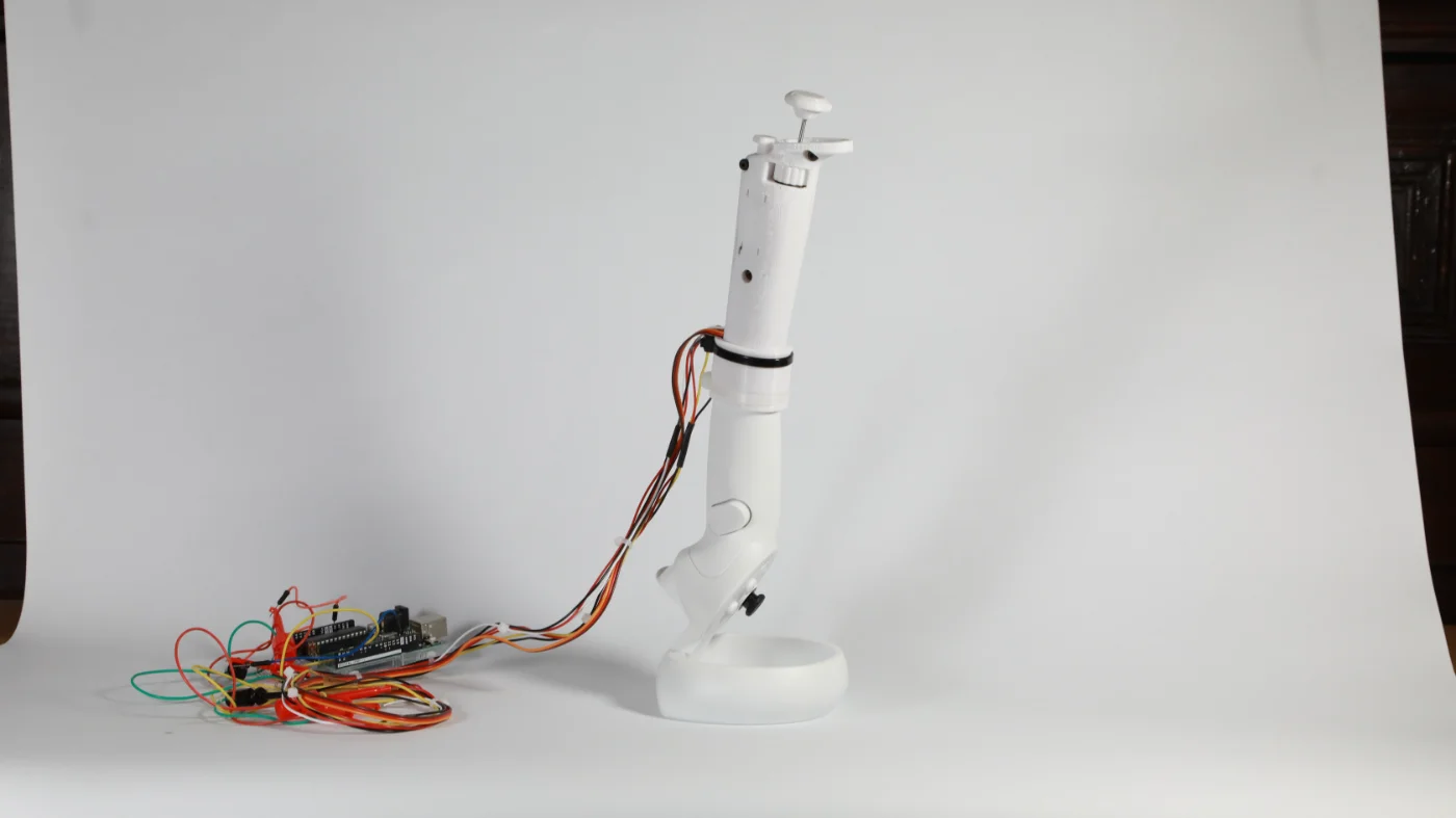Tethered prototype beside its control board